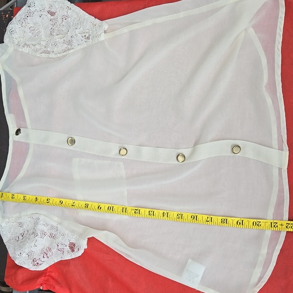 Cream colored lush cardigan with lacework sleeves and button up back like new - Picture 8 of 8